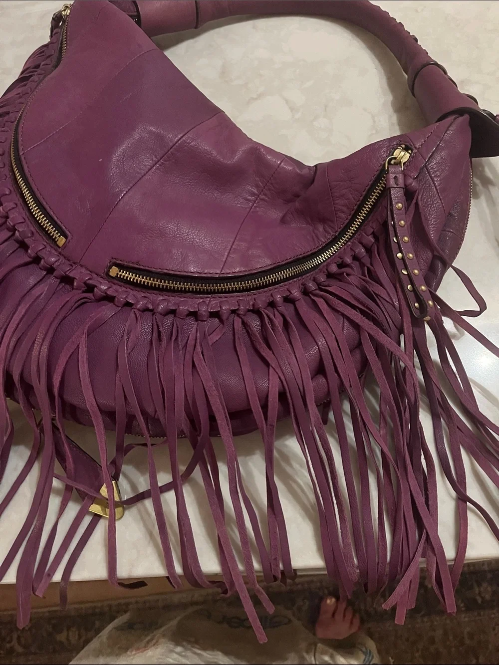 orYANY purple Studded  fringed Leather Hobo Bag with geometric interior material